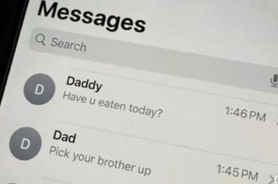 这是一张手机短信应用（Messages）的截图，显示了两个最近的对话。界面顶部有“Messages”标题和搜索栏，下方列出两条消息：联系人“Daddy”在下午1:46发送“Have u eaten today?”（你今天吃饭了吗？），联系人“Dad”在下午1:45发送“Pick your brother up”（去接你弟弟）。截图呈现了典型的手机聊天界面布局，时间戳显示两条消息发送时间相近。
