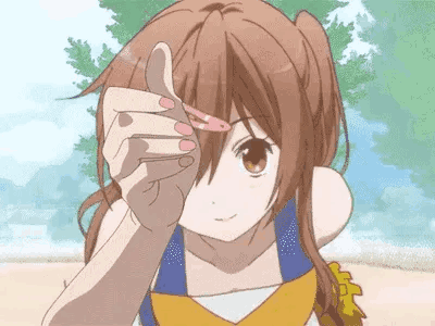 这是一段动态GIF，画面中的棕发动画女孩扎着侧马尾，戴着粉色发夹，身处有蓝天和绿植的户外清新场景中。她面带温柔的微笑，双手在身前做出连续流畅的手势变换：从握拳状态开始，逐渐抬手变换出遮挡半脸、类似比心的手势，整体氛围治愈可爱，动作自然灵动，传递出柔和的情绪。