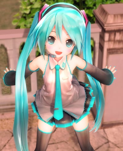 这是一张Q版风格的初音未来3D渲染图，角色有着标志性的青蓝色双马尾长发，佩戴耳机麦克风，身穿经典的VOCALOID公式服，身体前倾、双手张开，露出元气满满的开心笑容，背景是带有绿植的户外石质围栏场景，整体风格软萌治愈，充满活力。