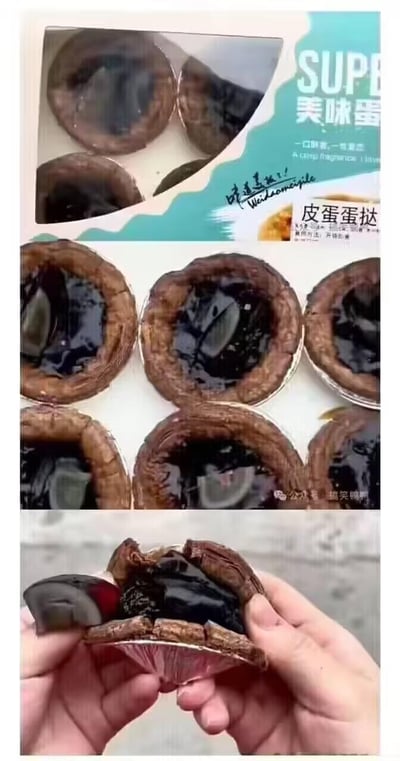 这是一组由三张图拼接的猎奇美食内容，展示了一款创意黑暗料理——皮蛋蛋挞：
1. 首张图是产品包装，标注「皮蛋蛋挞」，还有手写的「味道美极了！」字样，包装上还有「SUPB 美味蛋」「一口鲜香，一世难忘」的宣传语；
2. 第二张图是摆放整齐的皮蛋蛋挞，深棕色的蛋挞皮里是深黑色的凝固内馅，里面嵌着完整的皮蛋，视觉效果十分猎奇；
3. 第三张图是两只手掰开蛋挞，露出内部的皮蛋内馅和完整皮蛋，进一步展现这款黑暗料理的离谱搭配。
该内容通过将传统皮蛋与蛋挞结合，用强烈的视觉冲击制造搞笑、猎奇的效果，没有双关或谐音梗，纯靠食物的混搭反差带来趣味。
