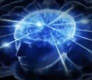 图片展示了一个侧面轮廓的头部剪影，内部是一个发出蓝色光芒的大脑，大脑表面有复杂的神经网络结构，多条明亮的光线从大脑中向外辐射，整体呈现出科技感和神秘感的视觉效果。