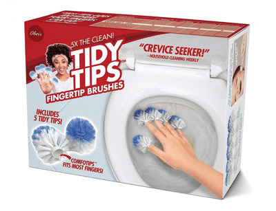 这是Obeir品牌的TIDY TIPS指尖清洁刷产品包装。包装主色调为红白相间，左上角有品牌标识，中央展示了一位卷发女性微笑着展示指尖上的蓝白清洁刷。包装正面突出宣传"5X THE CLEAN!"和"CREVICE SEEKER!"的产品特点，下方有产品名称"TIDY TIPS FINGERTIP BRUSHES"。右侧展示了产品使用场景——有人将指尖清洁刷伸入马桶内进行清洁。包装还标明产品包含5个指尖刷，具有"COMFOTIPS"设计，适合大多数手指尺寸。