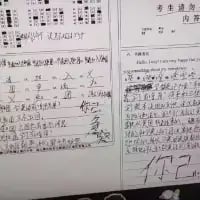这是一张左右拼接的黑白扫描图，左侧是带有红色批改痕迹的手写语文近义词练习页面，标注了日期“12月14日 星期五 农历十月廿二”，练习内容为词语近义词填写，全部批改正确，并有红色手写评语“书写工整！”及签名栏；右侧是标注“考生速查 内容页”的手写备考资料页面，记录了如《草原》作者老舍的相关文学常识等内容，整体为学生手写的学习相关材料，展现了日常作业练习和备考整理的场景。