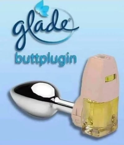 这是一张恶搞广告图片，将知名空气清新剂品牌Glade（佳丽）的标志与一个形似肛塞的物体结合，创造出低俗幽默效果。图片上方是Glade品牌的经典蓝色蝴蝶标志和手写体商标，下方则将原品牌的"PlugIns"产品名称改为谐音的"buttplugin"，并配上一个由银色金属头部和粉色空气清新器底座组成的混合物体。整个设计模仿了Glade空气清新剂的广告风格，但通过文字游戏和产品造型制造出性暗示的搞笑效果。