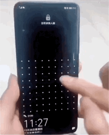 这是一段动态GIF，展示了一只手在恶搞的手机解锁界面上滑动操作。该解锁界面的点阵数量远超常见的9点解锁，是一个密密麻麻的大规模点阵布局，手指在复杂的点阵间滑动，呈现出一个几乎不可能记住的解锁路径，通过夸张的方式调侃过于复杂的解锁设置，充满搞笑效果。