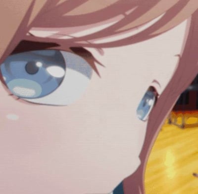 这是一段聚焦动漫少女脸部的动态GIF图，画面里的少女是《BanG Dream! It's MyGO!!!!!》中的高松灯，她的蓝灰色眼眸带着悲伤，一颗泪珠正从脸颊缓缓滑落，背景是模糊的暖黄色室内地板，整体画面充满了伤感、委屈的氛围，能够直观地传递出难过、想哭的情绪，常被用作表情素材来抒发这类心情。
